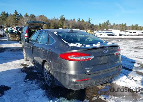 2020 Ford Fusion Hybrid Titanium z USA, uszkodzony, nr VIN 3FA6P0RUXLR100287